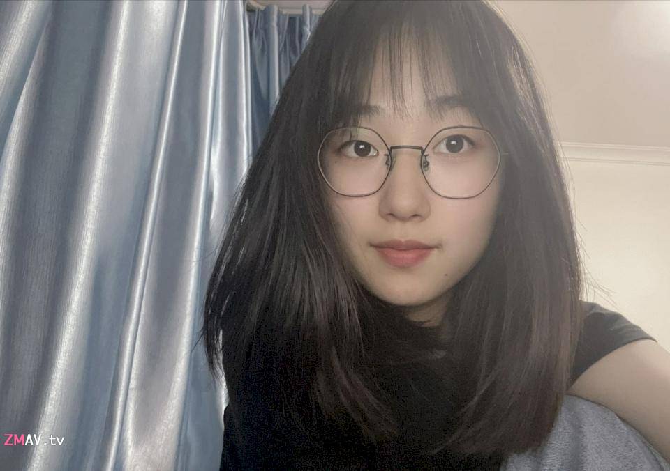 Sweet glasses girl rubs her big breasts, body curves are very attractive