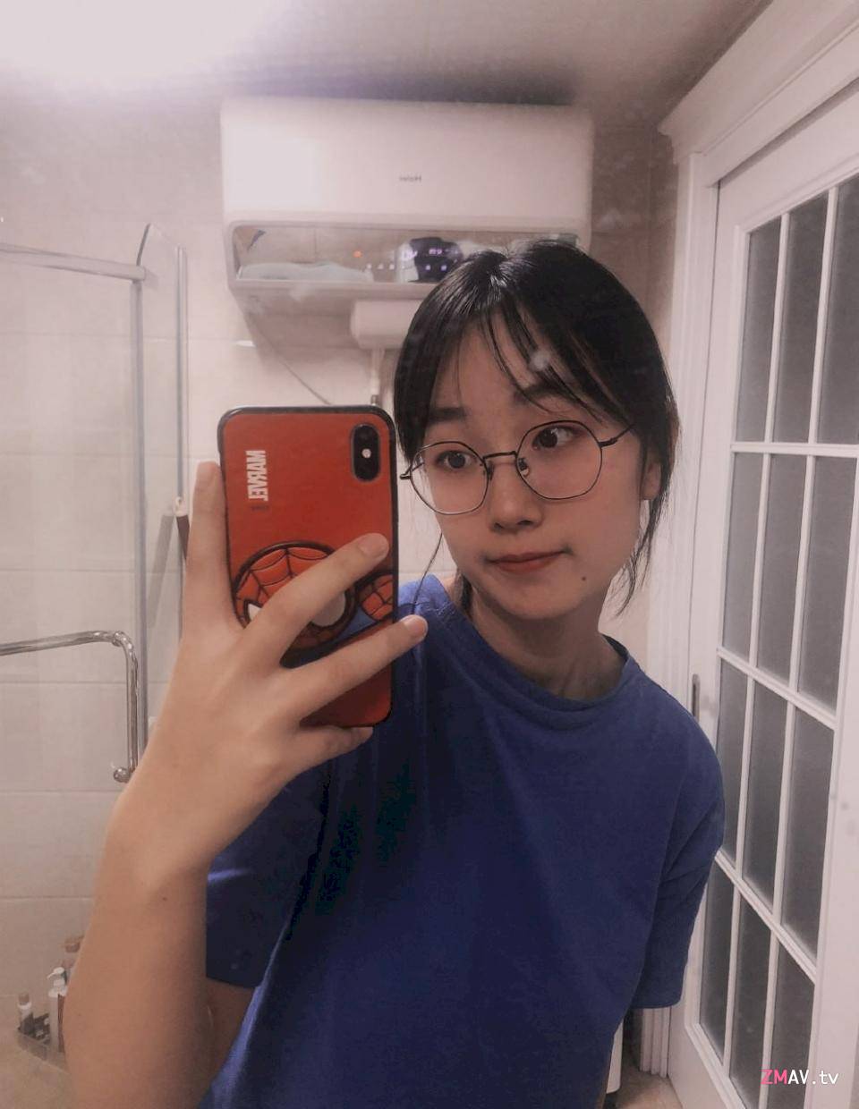 Sweet glasses girl rubs her big breasts, body curves are very attractive