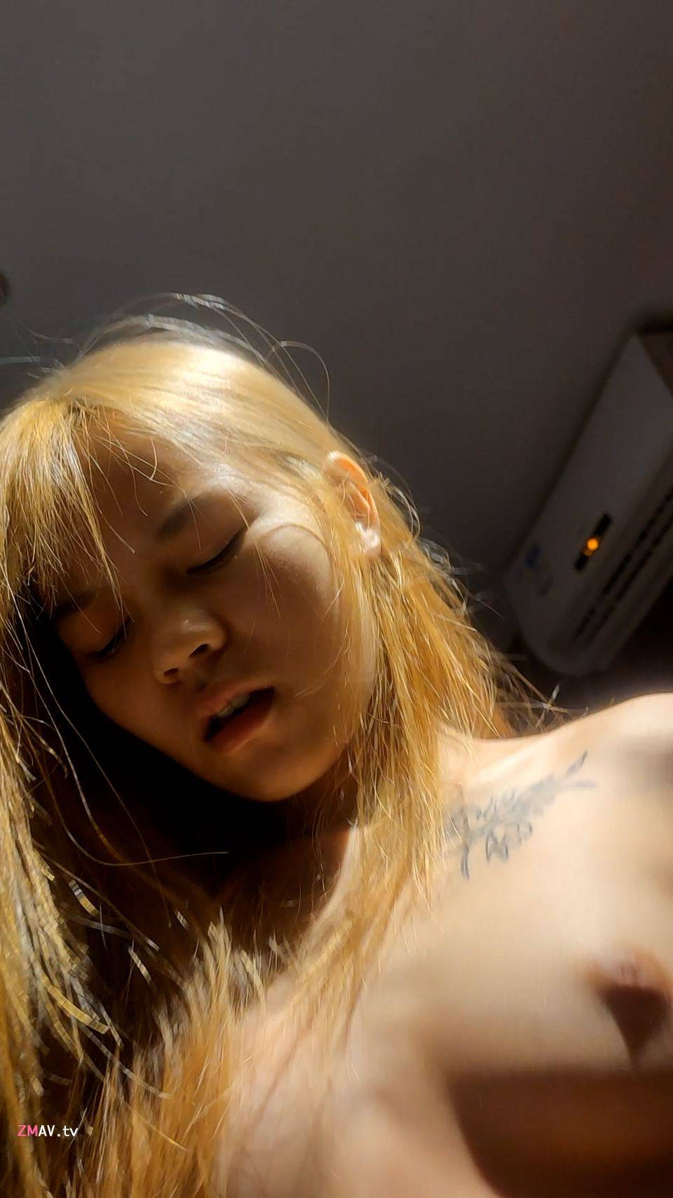 Nanning college student with blonde hair and tattoo Nanning college student with blonde hair and tattoo